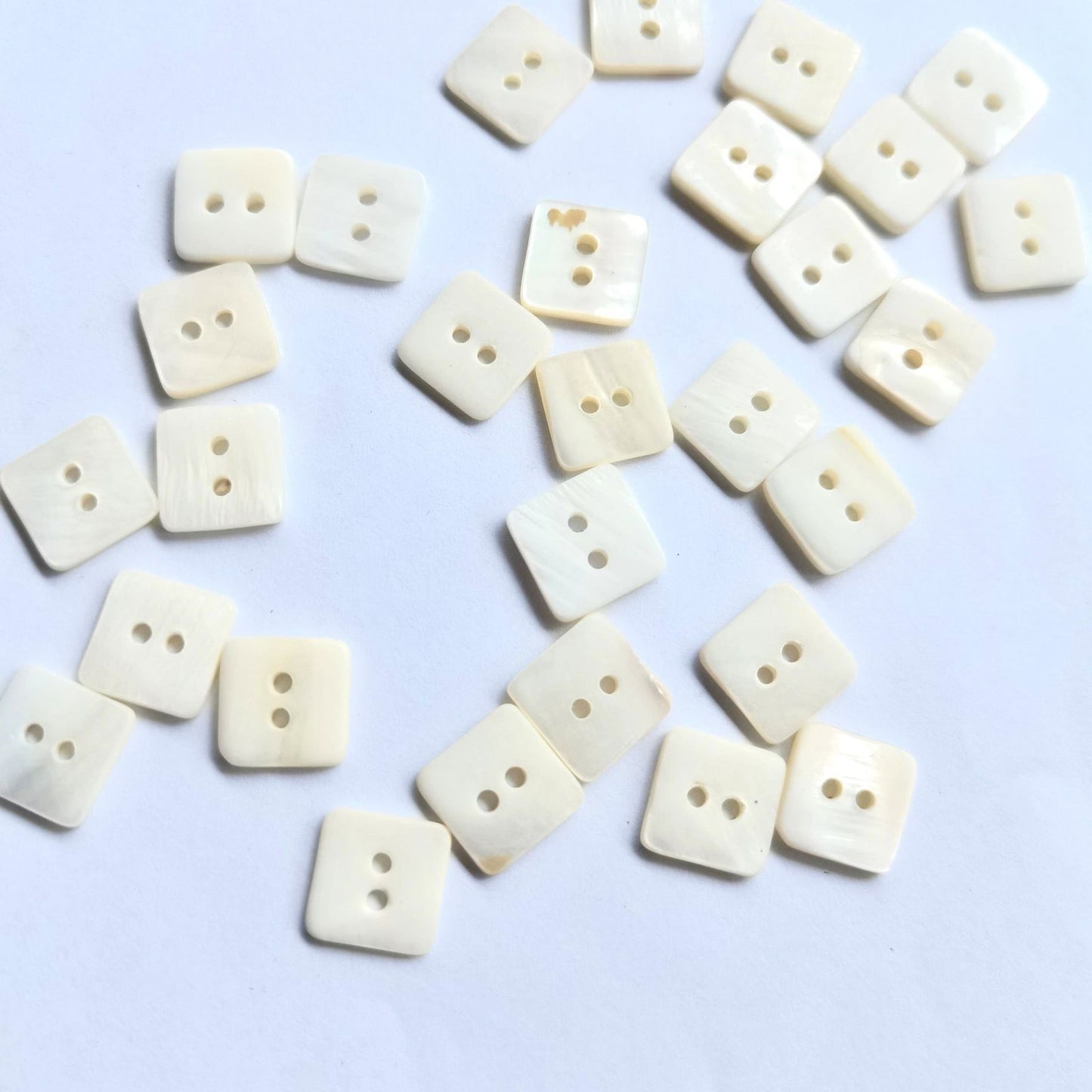 3009  Natural shell material, natural buttons, dyed buttons, spray paint dyed buttons, natural flaws, uneven