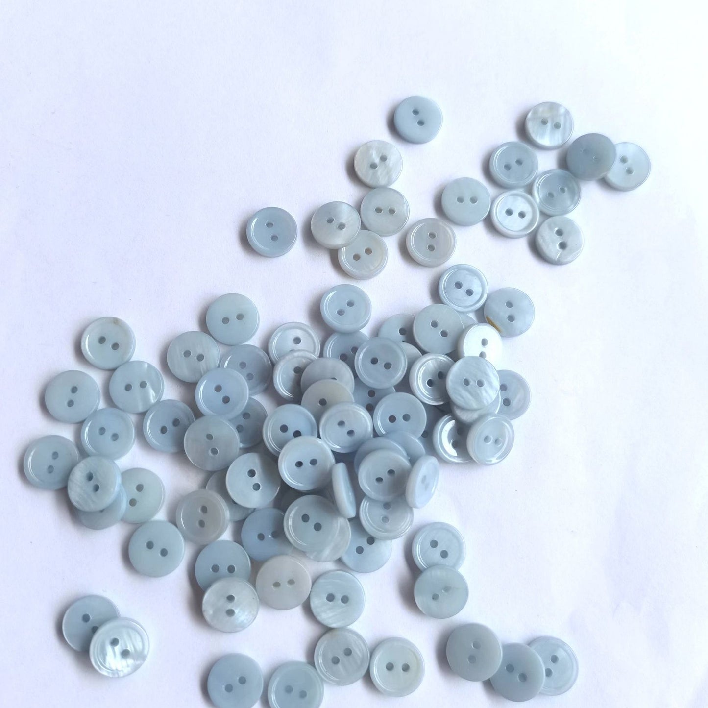 3009  Natural shell material, natural buttons, dyed buttons, spray paint dyed buttons, natural flaws, uneven