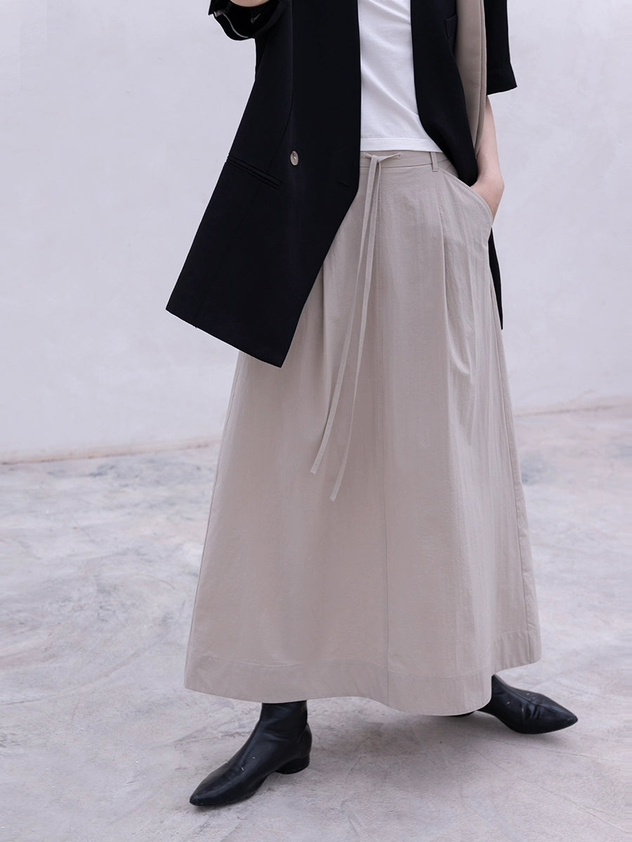 CAREMIND Falda plisada pequeña con cordón de cintura alta de color sólido para mujer, diseño de abertura, estilo simple, falda fina de palabra A, mediana y larga