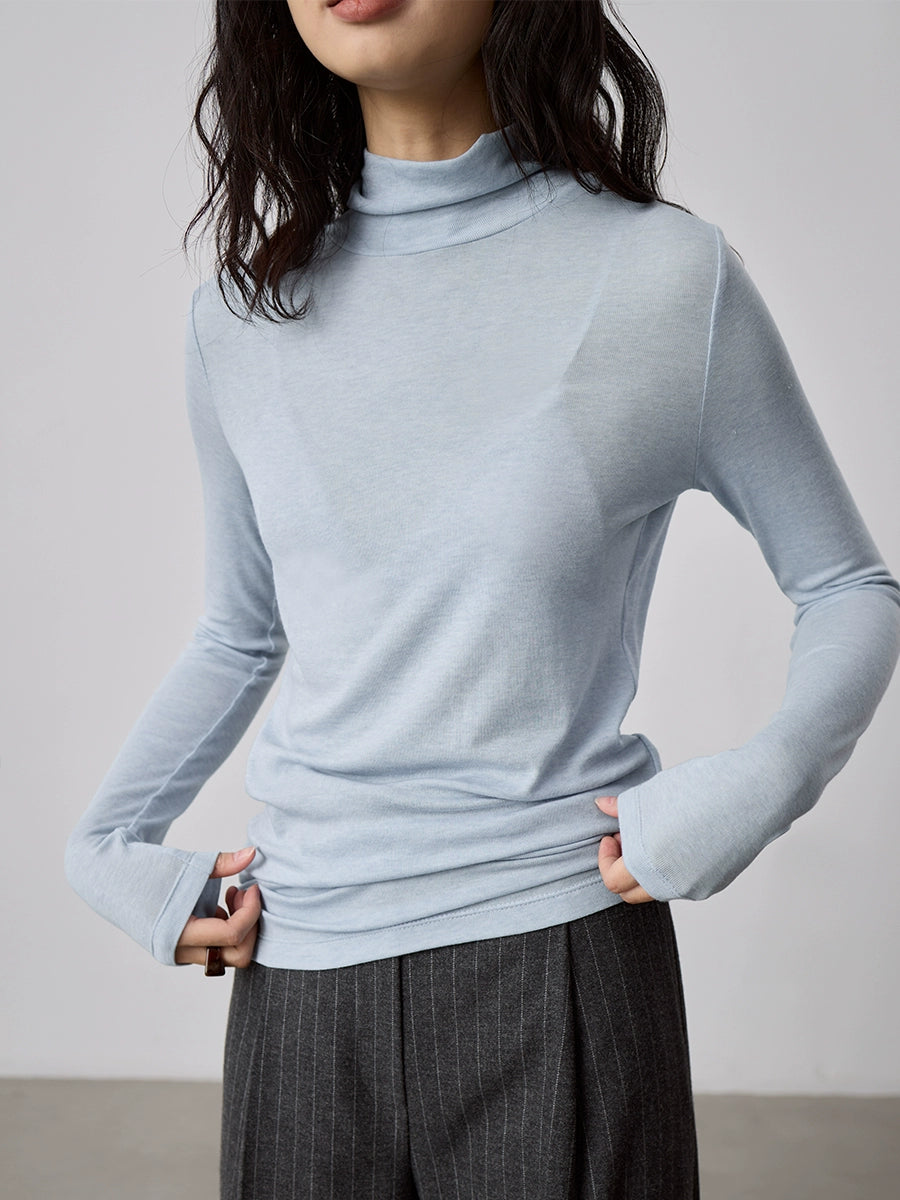 Camiseta de punto con cuello semialto apilado de tencel texturizado de CAREMIND Camiseta de manga larga apilada con cuello alto fino y ajustado