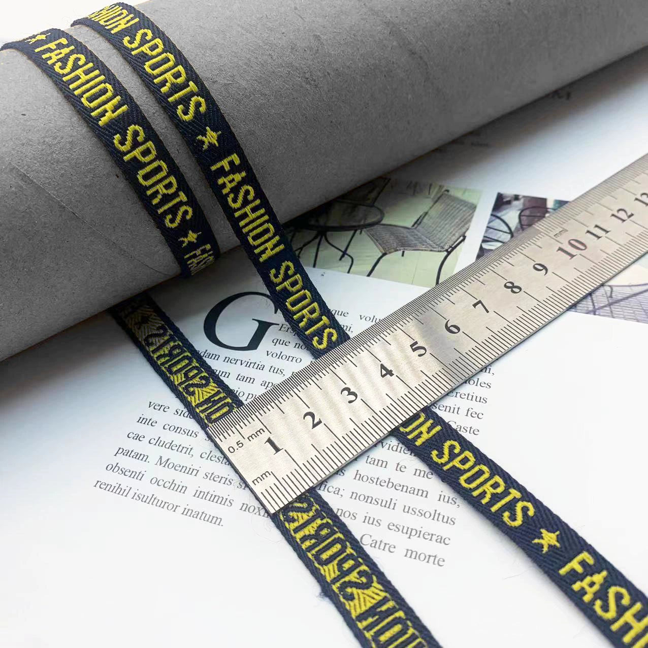 3852 Tira de prensado de borde de cinta jacquard con letras en blanco y negro de 1 cm, personalizada, para accesorios, ropa y textiles para el hogar