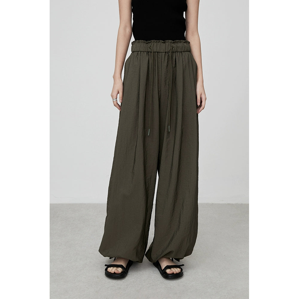 Pantalones anchos con cintura elástica color verde oliva elegantes de CAREMIND, monos casuales atados con forma de pera a la moda