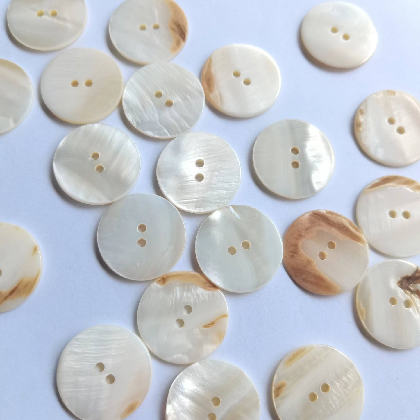 3009  Natural shell material, natural buttons, dyed buttons, spray paint dyed buttons, natural flaws, uneven