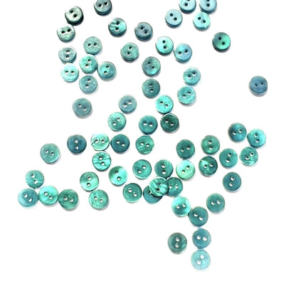 3009  Natural shell material, natural buttons, dyed buttons, spray paint dyed buttons, natural flaws, uneven