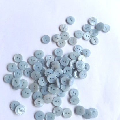 3009  Natural shell material, natural buttons, dyed buttons, spray paint dyed buttons, natural flaws, uneven