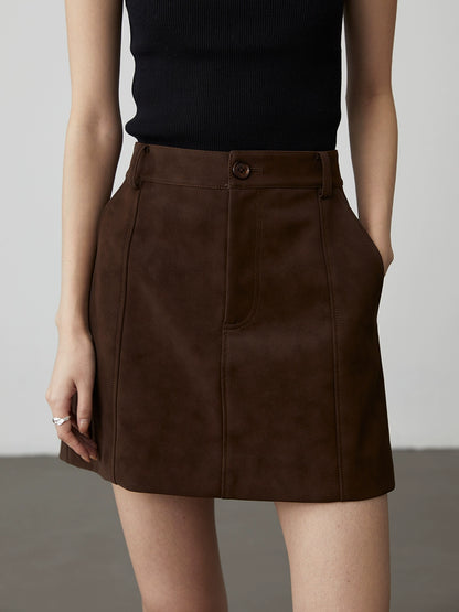 Falda pequeña de cuero con textura moderna urbana de dos colores café negro de CAREMIND, falda corta de PU con diseño anti-luz, falda con palabra A 