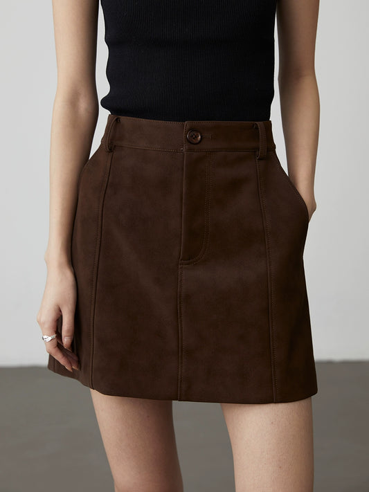 Falda pequeña de cuero con textura moderna urbana de dos colores café negro de CAREMIND, falda corta de PU con diseño anti-luz, falda con palabra A 