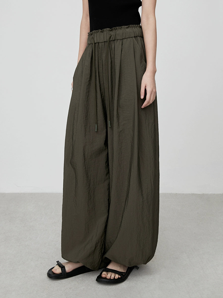 Pantalones anchos con cintura elástica color verde oliva elegantes de CAREMIND, monos casuales atados con forma de pera a la moda 