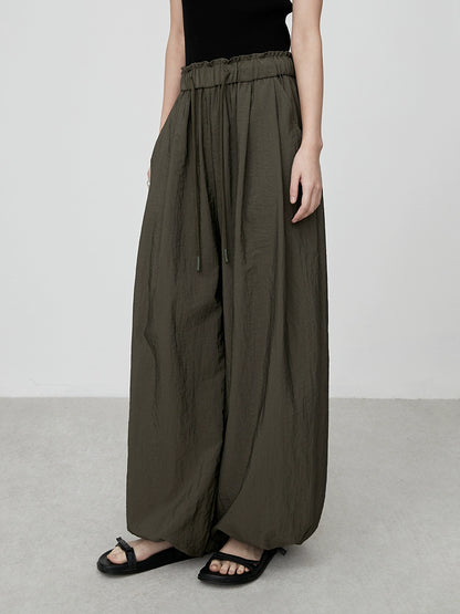 Pantalones anchos con cintura elástica color verde oliva elegantes de CAREMIND, monos casuales atados con forma de pera a la moda 