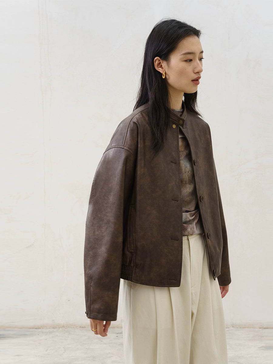 [Urban Nomad] CAREMIND retro yellow-brown leather jacket Merad stand-up collar temperament top