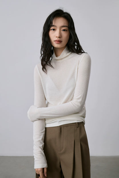 Camiseta de punto con cuello semialto apilado de tencel texturizado de CAREMIND Camiseta de manga larga apilada con cuello alto fino y ajustado 