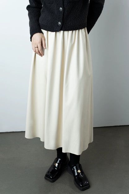 CAREMIND [Urban Street] Falda de cuero ajustada con cintura elástica y banda de goma de PU para mujer 