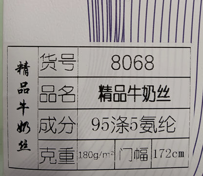 3907 Forro de punto de seda de leche Tela plana Tela de elastano de punto de alta elasticidad Forro de tela de sudor Seda de leche elástica de cuatro lados 8068