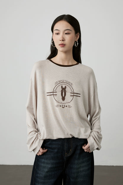 [Camiseta ecuestre] Camiseta con estampado de avena CAREMIND agradable para la piel, holgada, con cuello redondo y manga larga en color contrastante 