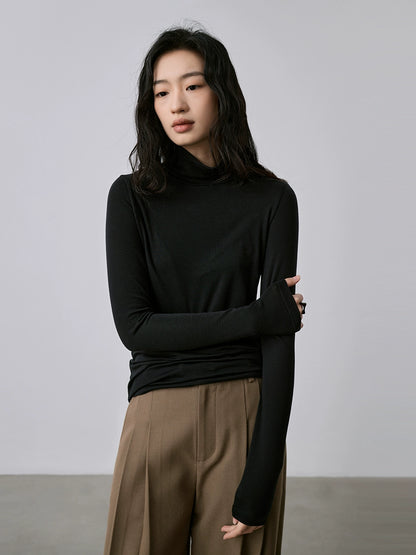 Camiseta de punto con cuello semialto apilado de tencel texturizado de CAREMIND Camiseta de manga larga apilada con cuello alto fino y ajustado 