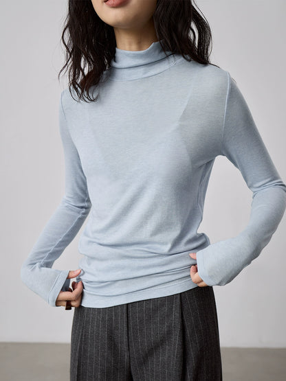 Camiseta de punto con cuello semialto apilado de tencel texturizado de CAREMIND Camiseta de manga larga apilada con cuello alto fino y ajustado 