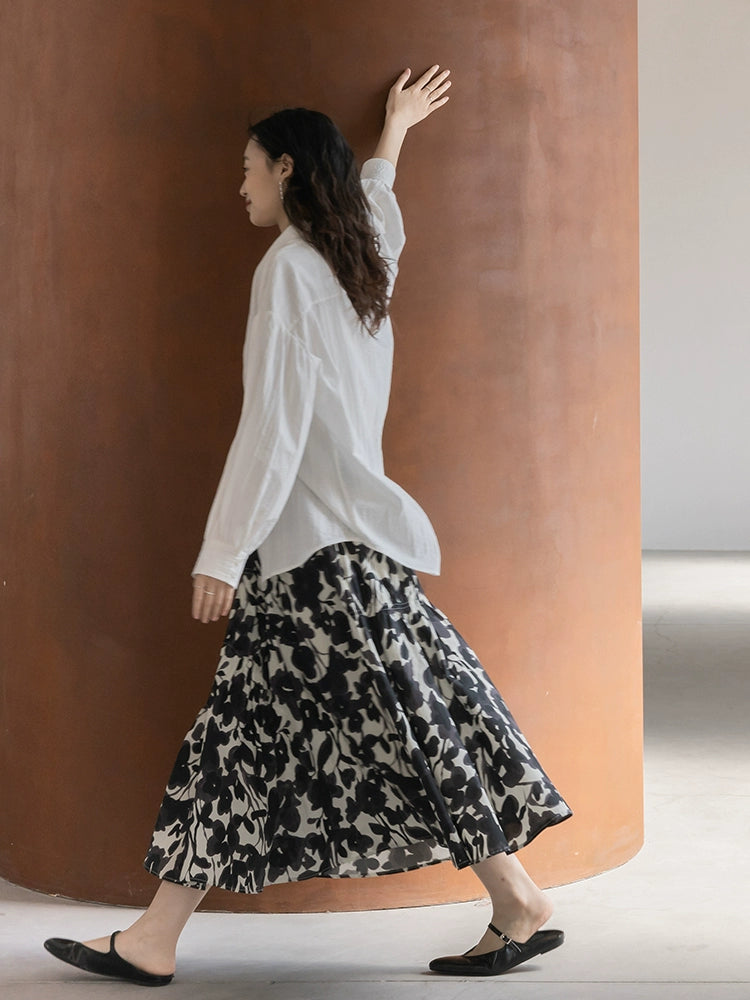 CAREMIND 24SS [refinado] falda floral de otoño para mujer cintura elástica media y larga que cubre la cadera falda en forma de A nueva 