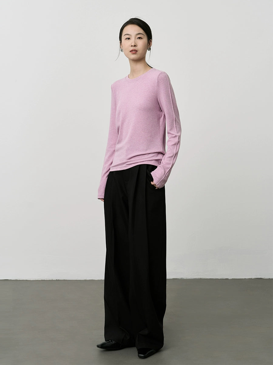 Camiseta de cuello redondo con parte inferior de color rosa suave y ceroso de CAREMIND 2024 Nueva camiseta de manga larga interior premium 