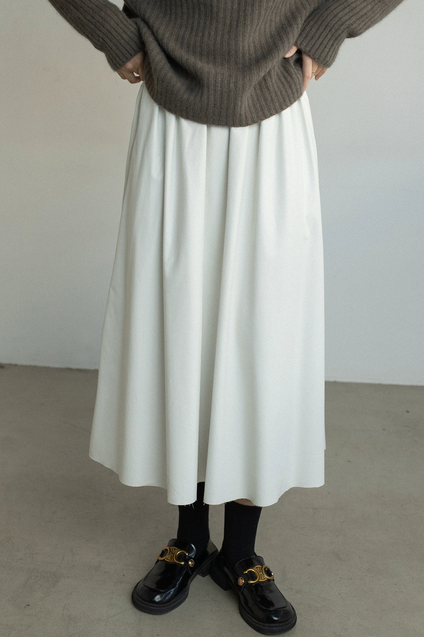 CAREMIND [Urban Street] Falda de cuero ajustada con cintura elástica y banda de goma de PU para mujer 