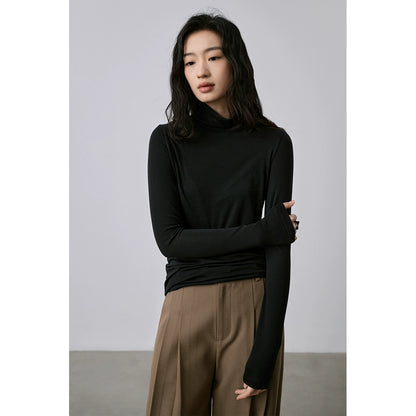 Camiseta de punto con cuello semialto apilado de tencel texturizado de CAREMIND Camiseta de manga larga apilada con cuello alto fino y ajustado 