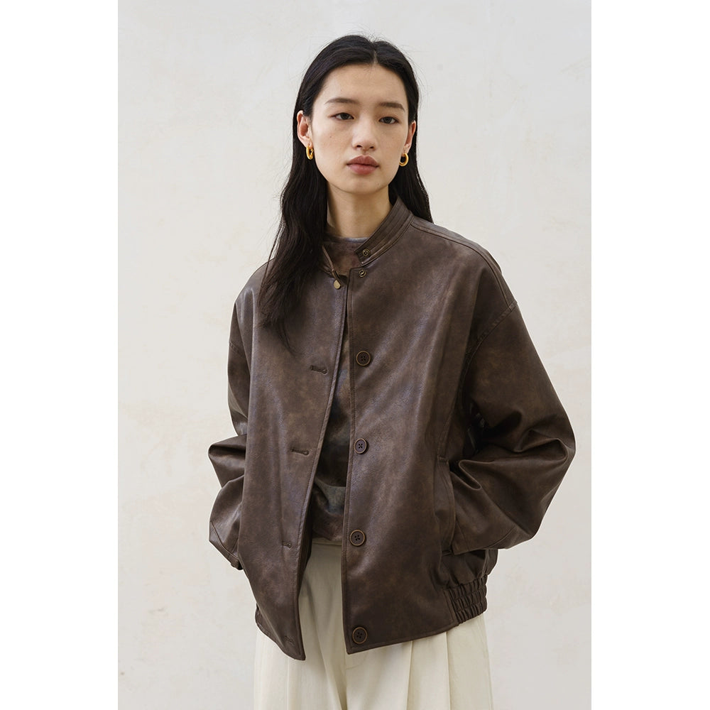 [Urban Nomad] CAREMIND retro yellow-brown leather jacket Merad stand-up collar temperament top