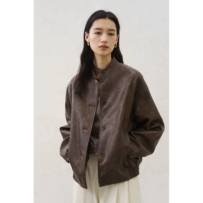 [Urban Nomad] CAREMIND retro yellow-brown leather jacket Merad stand-up collar temperament top