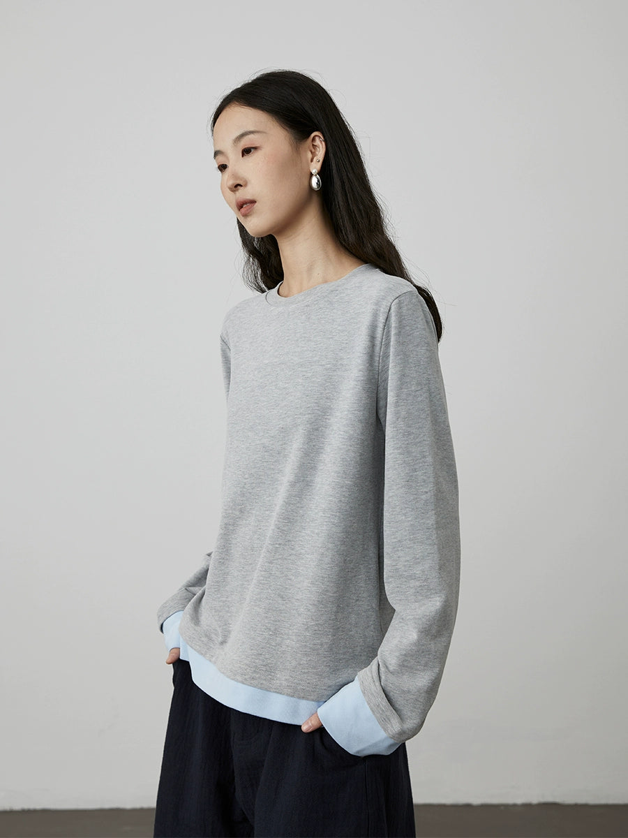 [Soft touch] CAREMIND early autumn splicing fake two-piece long-sleeved casual T-shirt design sense inner top