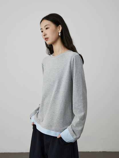 [Soft touch] CAREMIND early autumn splicing fake two-piece long-sleeved casual T-shirt design sense inner top