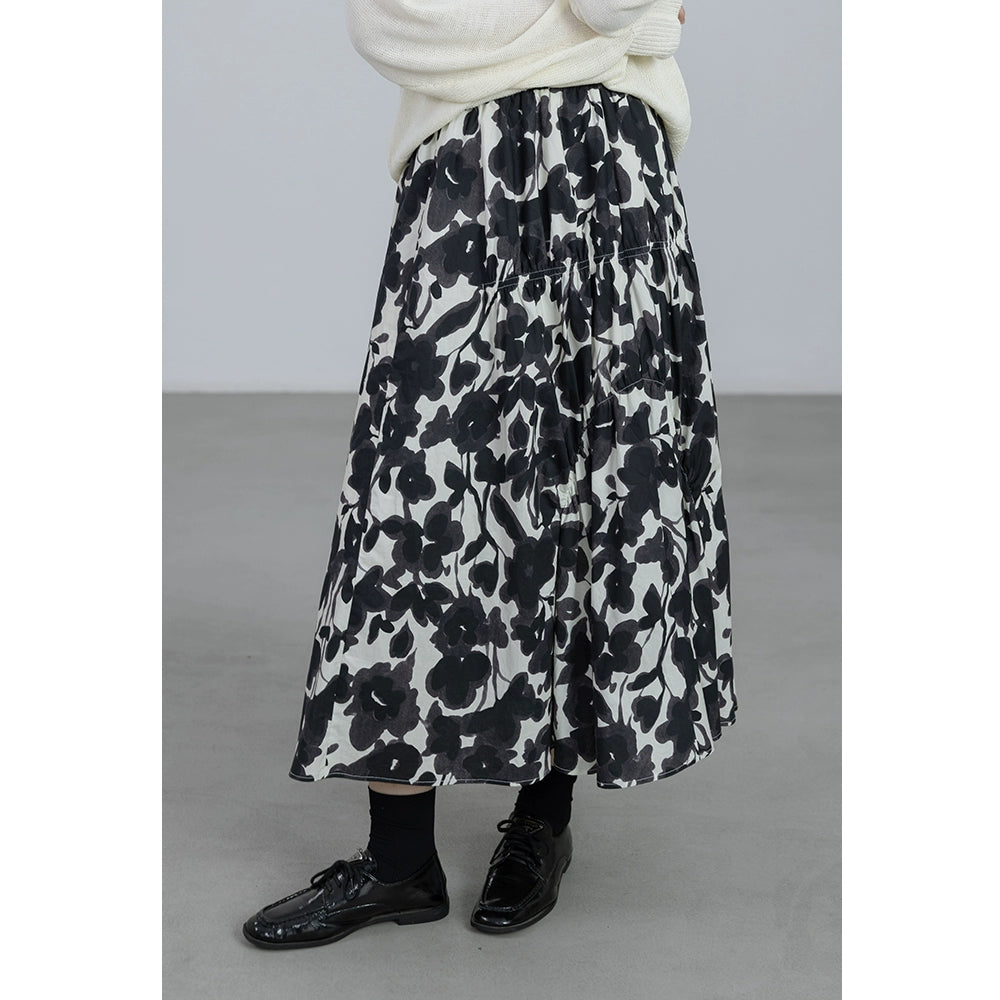 CAREMIND 24SS [refinado] falda floral de otoño para mujer cintura elástica media y larga que cubre la cadera falda en forma de A nueva 