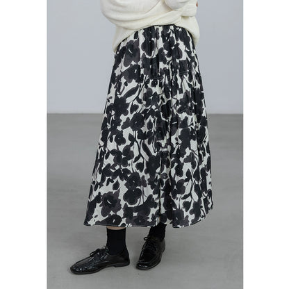 CAREMIND 24SS [refinado] falda floral de otoño para mujer cintura elástica media y larga que cubre la cadera falda en forma de A nueva 