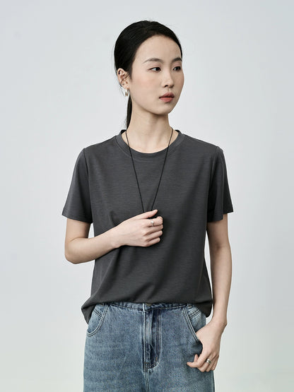 Camiseta básica clásica de cuello redondo de color liso de manga corta con hombros descubiertos para mujer de CAREMIND 