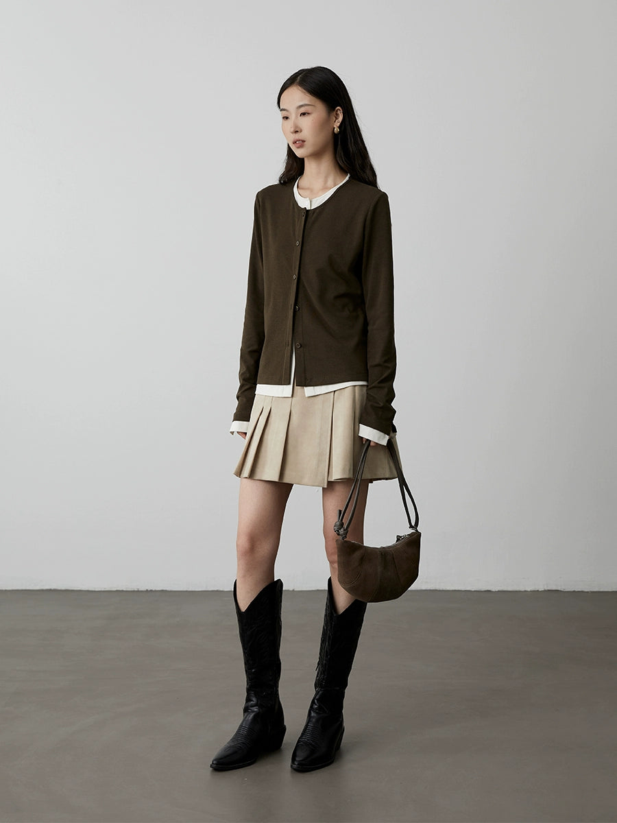 [Pliegues de cuero] Falda corta plisada de gamuza de cintura alta y versátil de CAREMIND, falda de palabra A que cubre la cadera y que parece delgada para hombres pequeños 