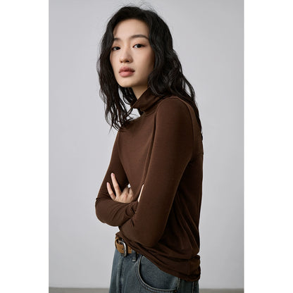 Camiseta de punto con cuello semialto apilado de tencel texturizado de CAREMIND Camiseta de manga larga apilada con cuello alto fino y ajustado 