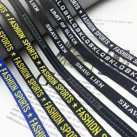 3852 Tira de prensado de borde de cinta jacquard con letras en blanco y negro de 1 cm, personalizada, para accesorios, ropa y textiles para el hogar