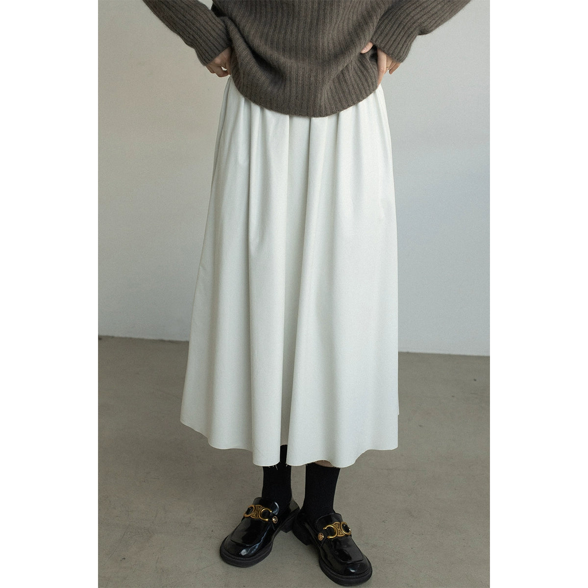 CAREMIND [Urban Street] Falda de cuero ajustada con cintura elástica y banda de goma de PU para mujer 