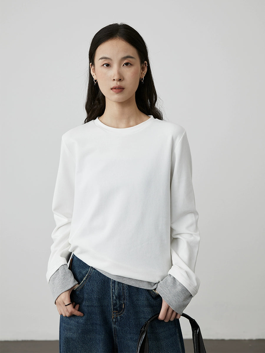 [Soft touch] CAREMIND early autumn splicing fake two-piece long-sleeved casual T-shirt design sense inner top