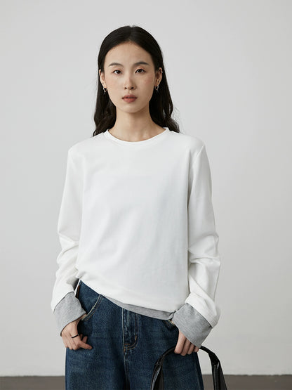 [Soft touch] CAREMIND early autumn splicing fake two-piece long-sleeved casual T-shirt design sense inner top