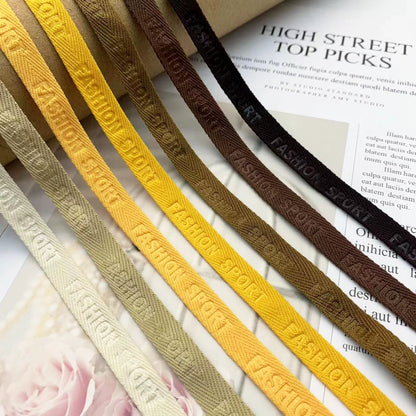 3876 Spot 1 cm Color letra en espiga en relieve cinta de borde prensado Accesorios Correa de cuello trasero Tira lateral de ropa