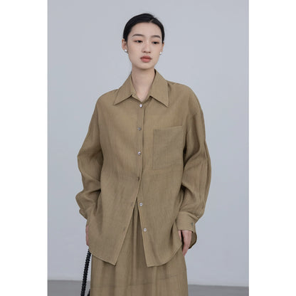 Conjunto de dos piezas de camisa de manga larga con colgante CAREMIND 24SS + falda en forma de A, sal de textura oscura 