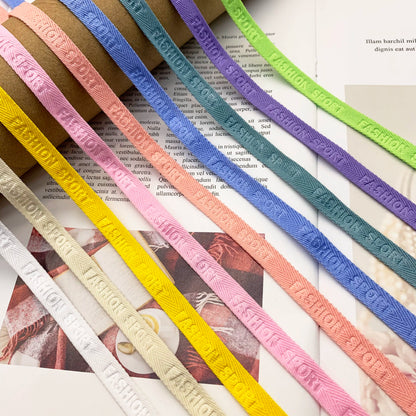 3876 Spot 1 cm Color letra en espiga en relieve cinta de borde prensado Accesorios Correa de cuello trasero Tira lateral de ropa